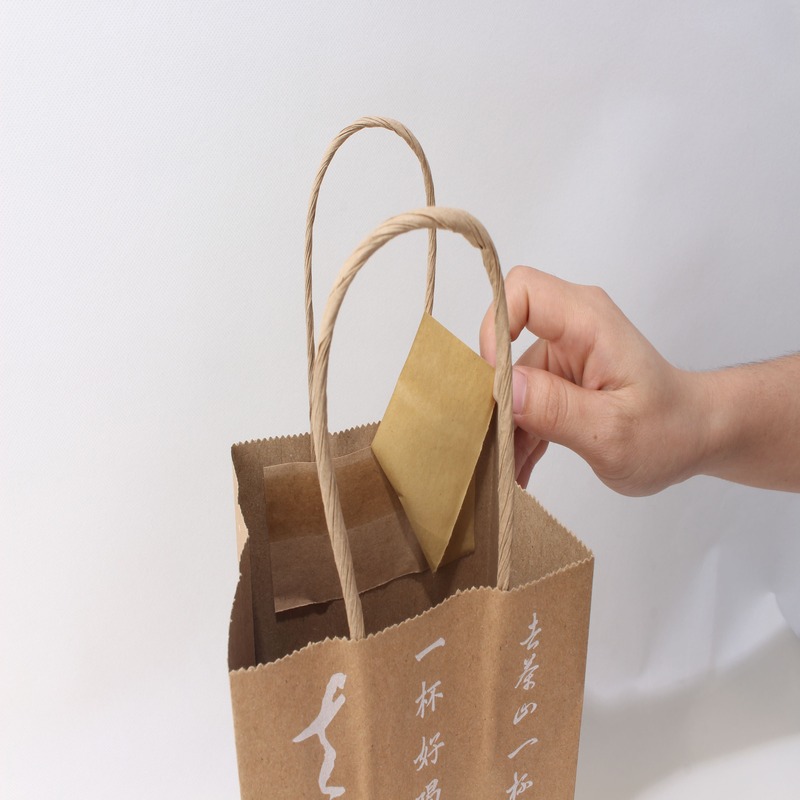 Introducing Our Practical Handle Paper Bags with Double-Sided Adhesive Tape